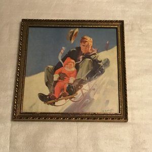 Vintage 1930's framed Hy Hintermeister picture of man and his son on sled
